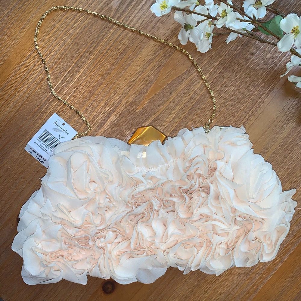 Cream floral clutch